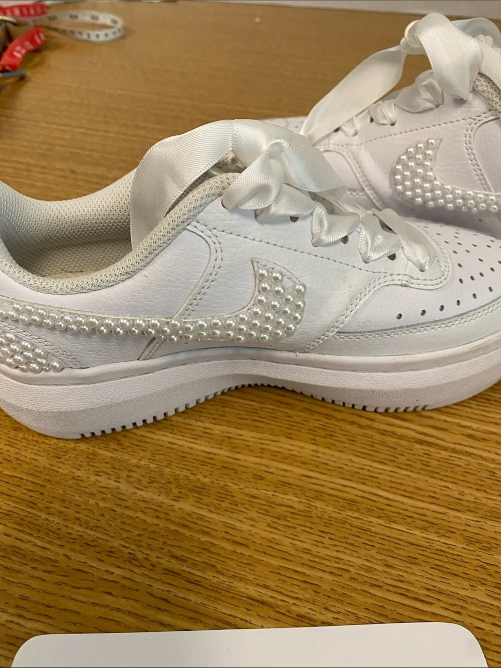 Nike White Platform Sneakers with Pearl Swoosh